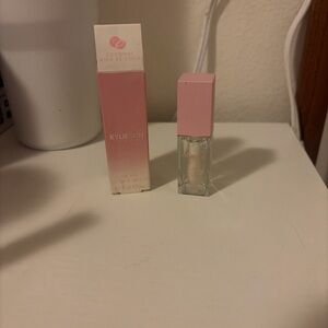 KYLIE SKIN Coconut Lip Oil — Clear Balm with Pink Cap